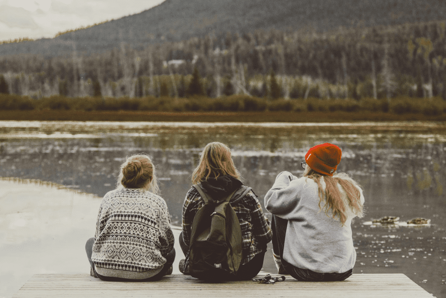 Sober Support Group Between Three People Near a Lake