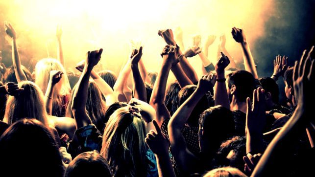 Club Drug Dependency (Ecstasy, MDMA, LSD, etc.) Treatment in Delray Beach People at a party with hands in the air