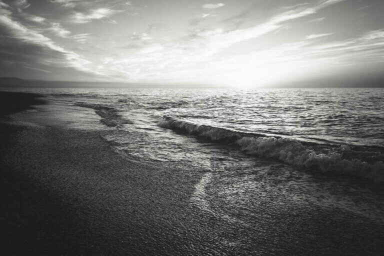 Beach with Waves and Sunset
