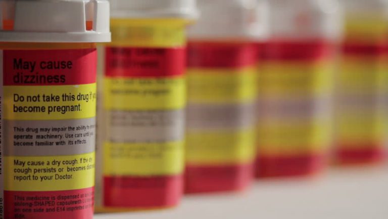Prescription Medicine Bottles in a Line