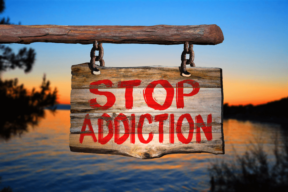 sign reading stop addiction