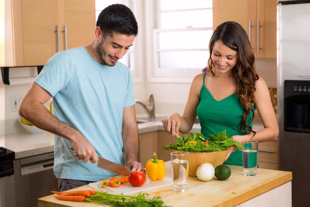 Couple Preparing a Healthy Meal After Recovery